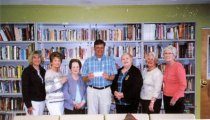 Alpha Omega presents check to Evans Home, 2014
